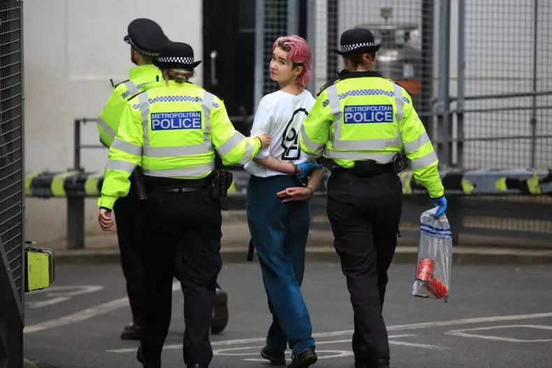 police-walk-protester-handcuffs