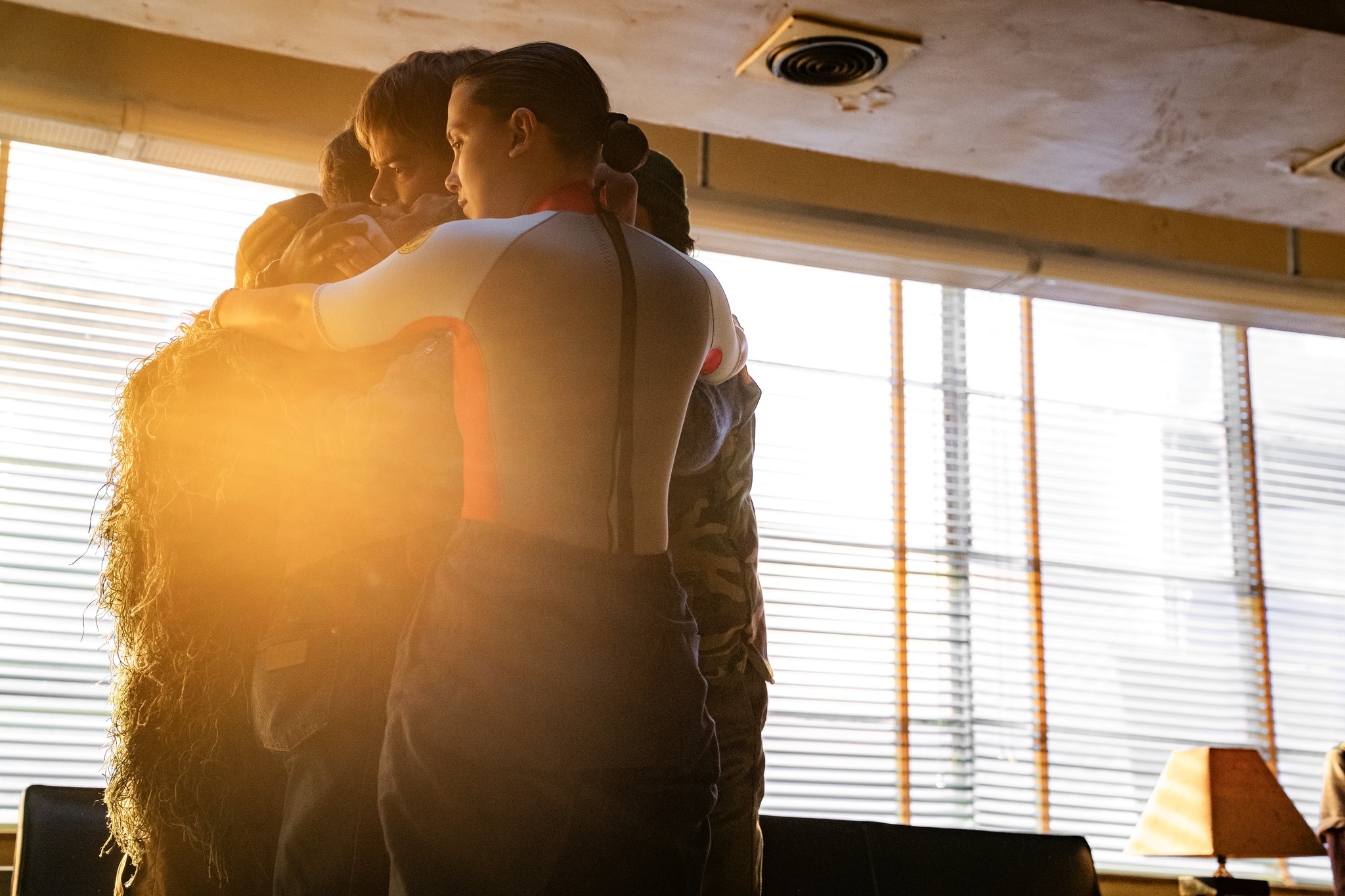 STRANGER THINGS: SEASON 5. (L to R) Charlie Heaton as Jonathan Byers and Millie Bobby Brown as Eleven behind the scenes of Stranger Things: Season 5. Cr. Niko Tavernise/Netflix © 2024