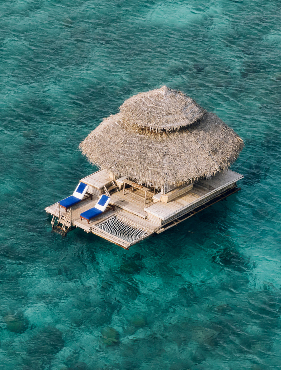 amanpulo_philippines_-_experience_floating_kawayan_bar_aerial_4_1